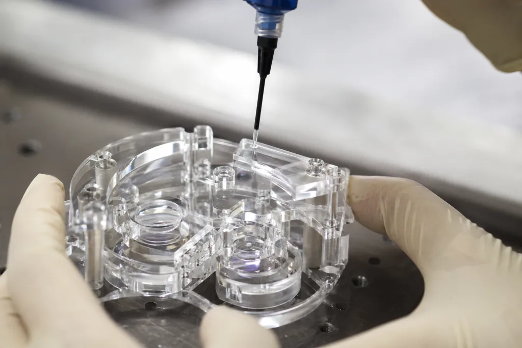 electronic adhesive optical assembly