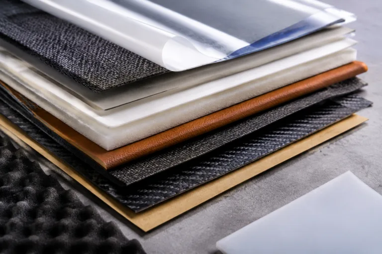 Laminating Adhesive 10 A realistic industrial composition showing multiple material layers prepared for lamination, including film, fabric, foam, plastic, paper, leather, and composite materials on a clean background.