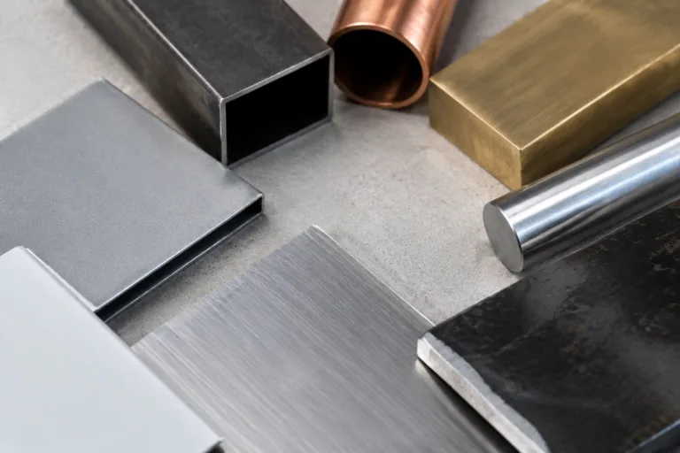Metal Adhesive 10 A realistic technical product photo showing multiple metal types used for adhesive selection, including aluminum, stainless steel, carbon steel, copper, brass, and coated metal samples, arranged for bonding evaluation.