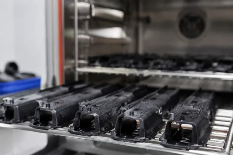 Plastic Adhesive 17 A realistic close-up product testing scene showing bonded plastic parts being evaluated for durability, long-term reliability, and resistance to environmental stresses in a clean industrial lab setting.