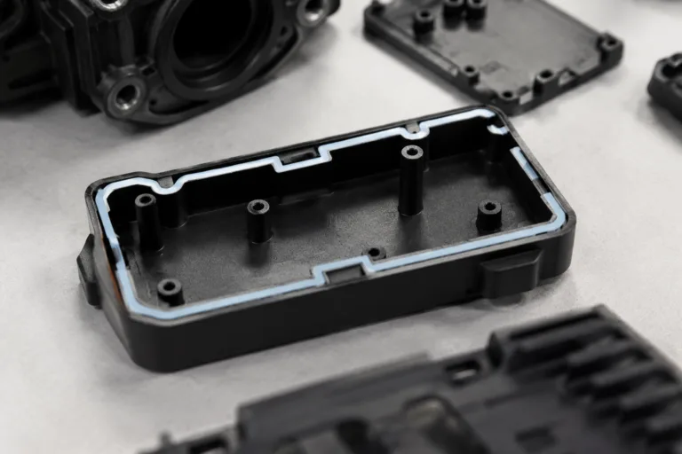 Plastic Adhesive 14 A realistic manufacturing close-up highlighting gap size and joint design considerations for plastic adhesive selection, with clean professional product photography and precision plastic parts.