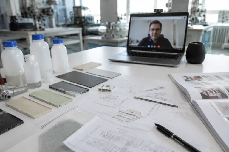 Become a ZDS Adhesive Distributor 5 A realistic premium B2B manufacturer scene showing technical consultation support for adhesive distributors, with adhesive samples, material test coupons, application sketches, and a remote collaboration atmosphere.