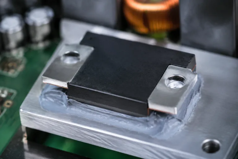 Thermally Conductive Adhesive 14 A realistic close-up of an electronic component attached with thermally conductive adhesive, emphasizing heat dissipation and electrical insulation in a clean technical setting.