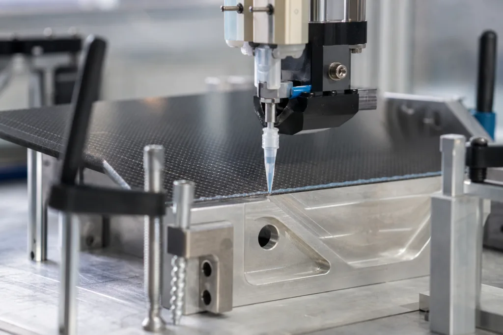 How to Bond Carbon Fiber to Metal Reliably 2 controlled adhesive application carbon fiber metal